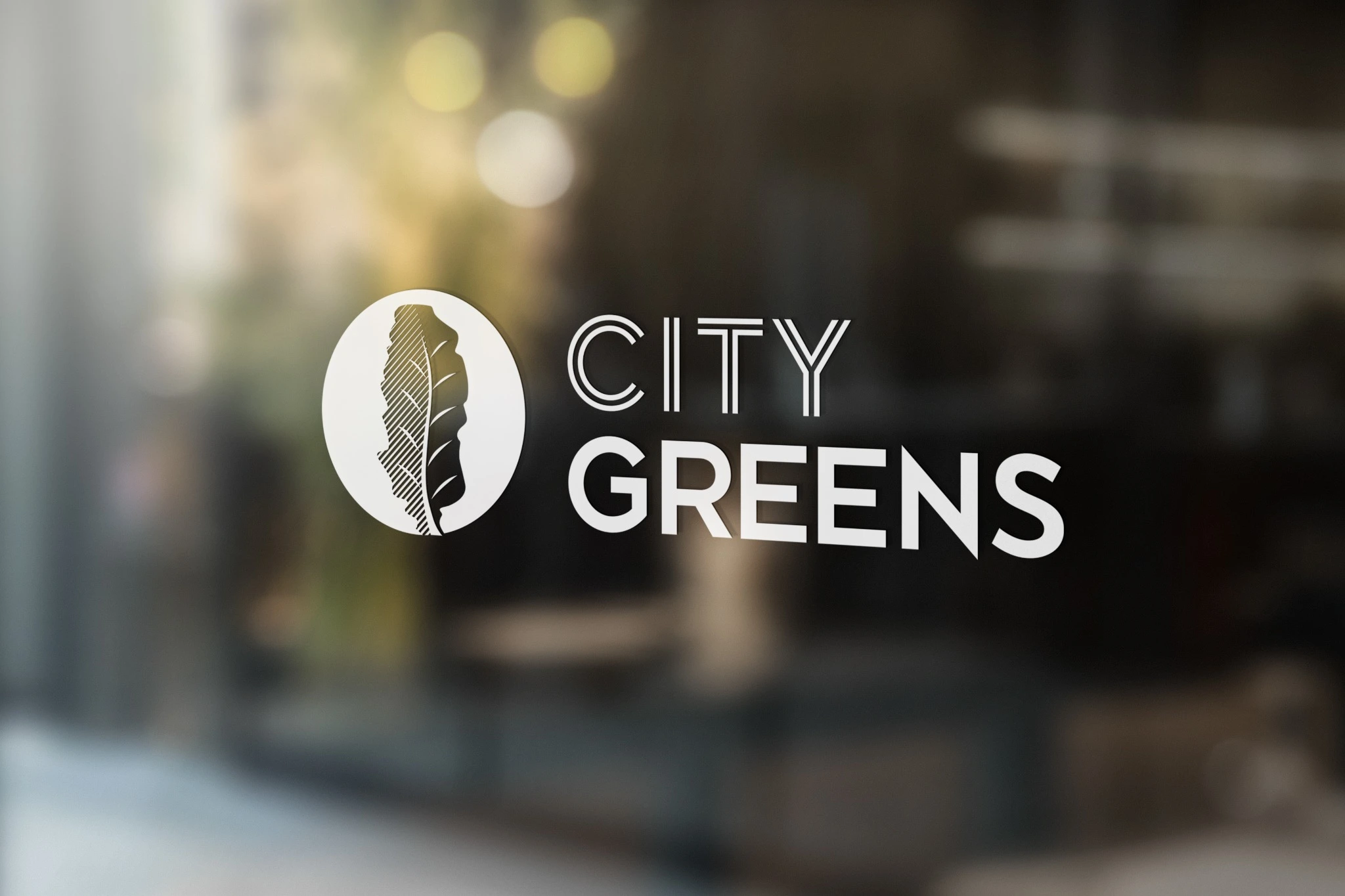 The City Greens identity applied to storefront glass. Signage mockup.