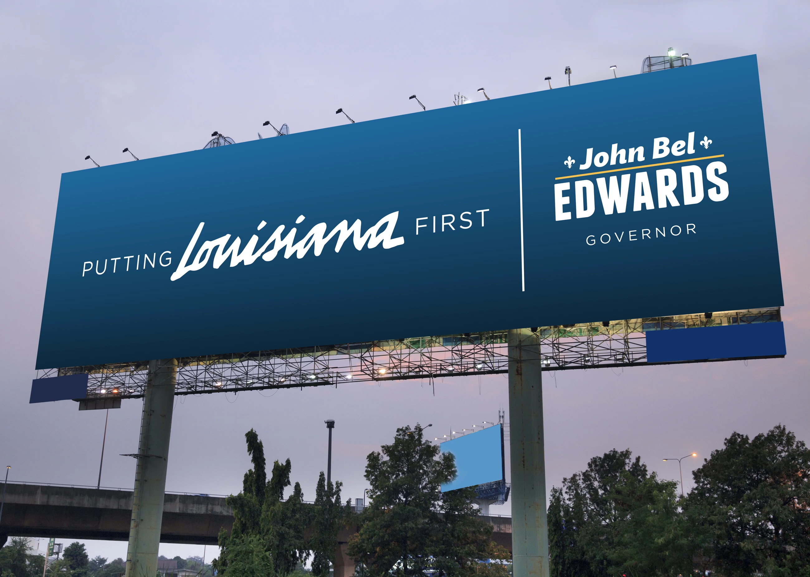 John Bel Edwards campaign billboard design with blue background, white lettering, and gold accents