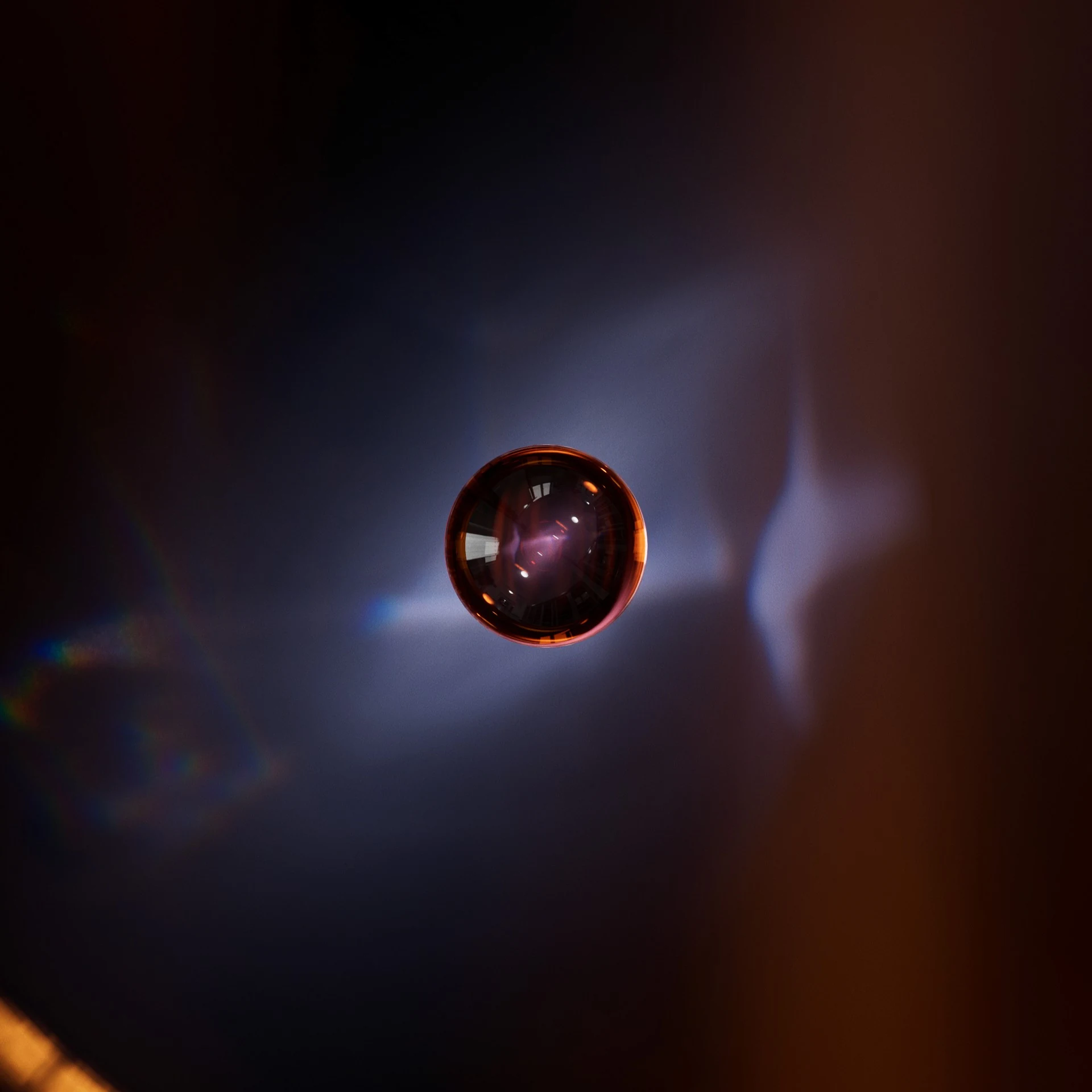 A gemstone held in a pool of light.
